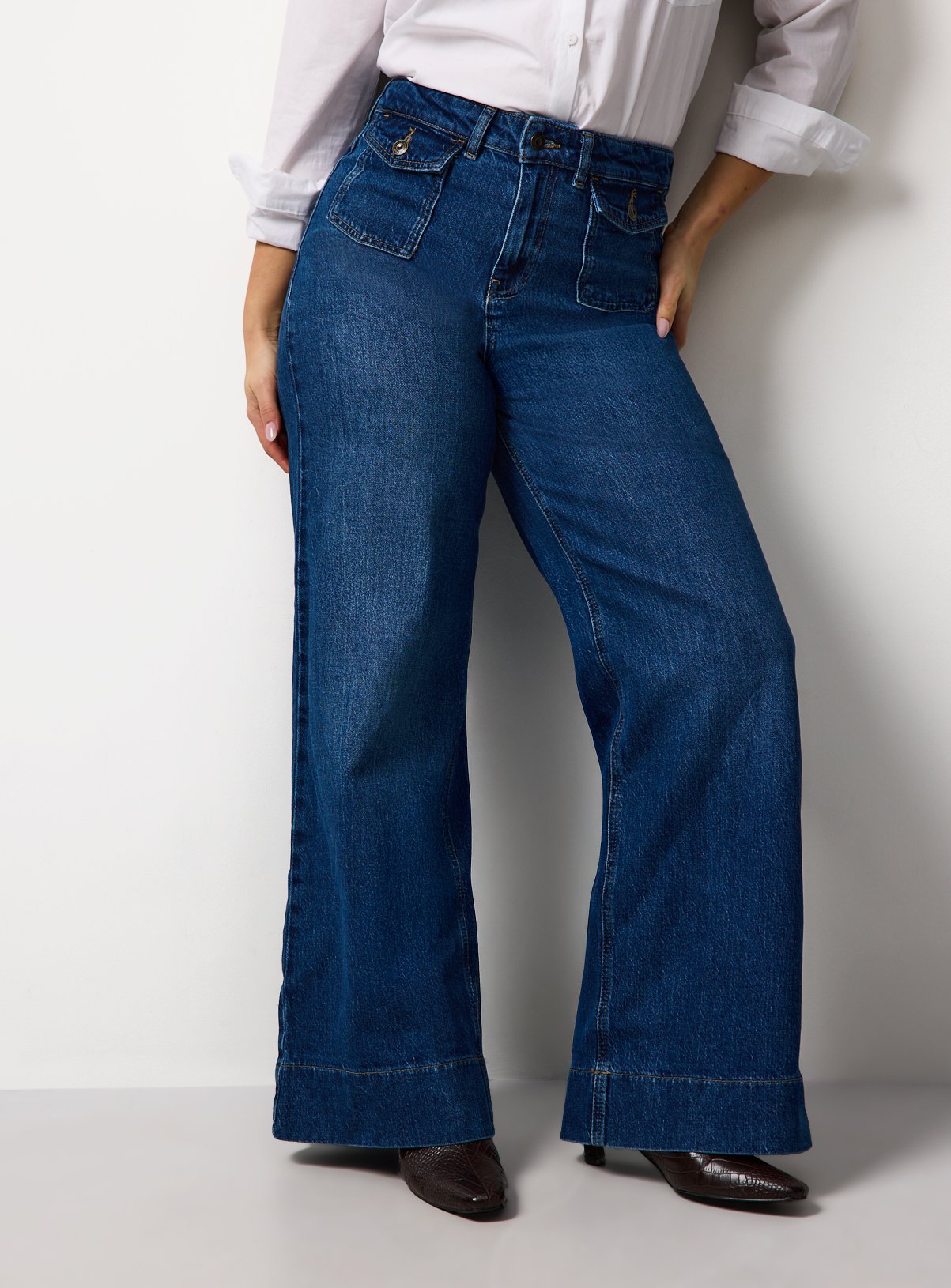 The Mid Blue Flared Leg Denim Jeans 10R - Image 1 thumbnail